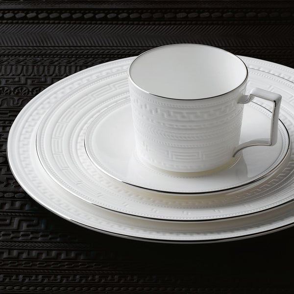 Intaglio Set of four Coffee Cups & Saucers